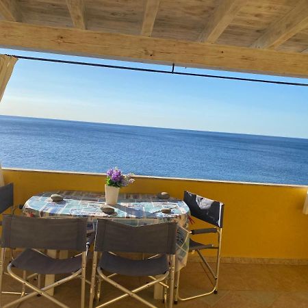 La Casa Gialla Cala Gonone Bagian luar foto