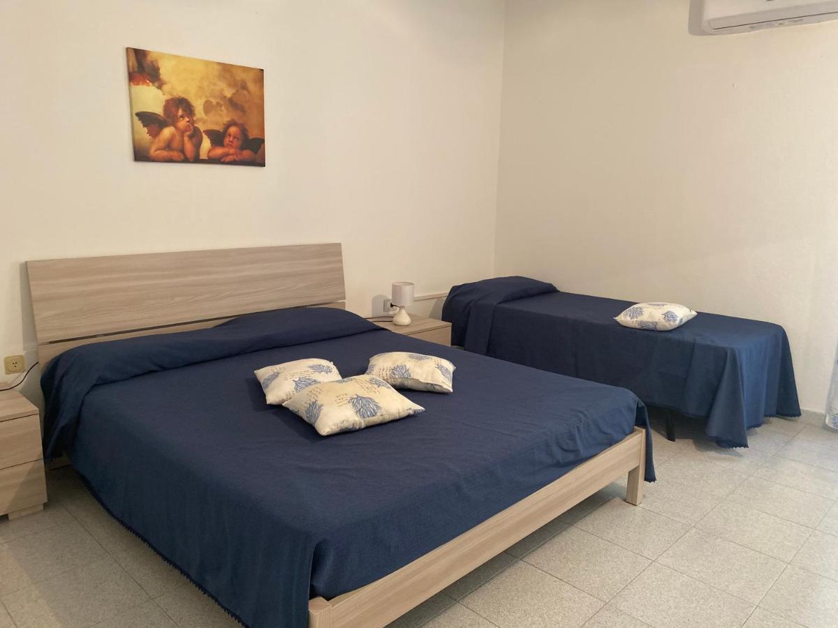 La Casa Gialla Cala Gonone Bagian luar foto