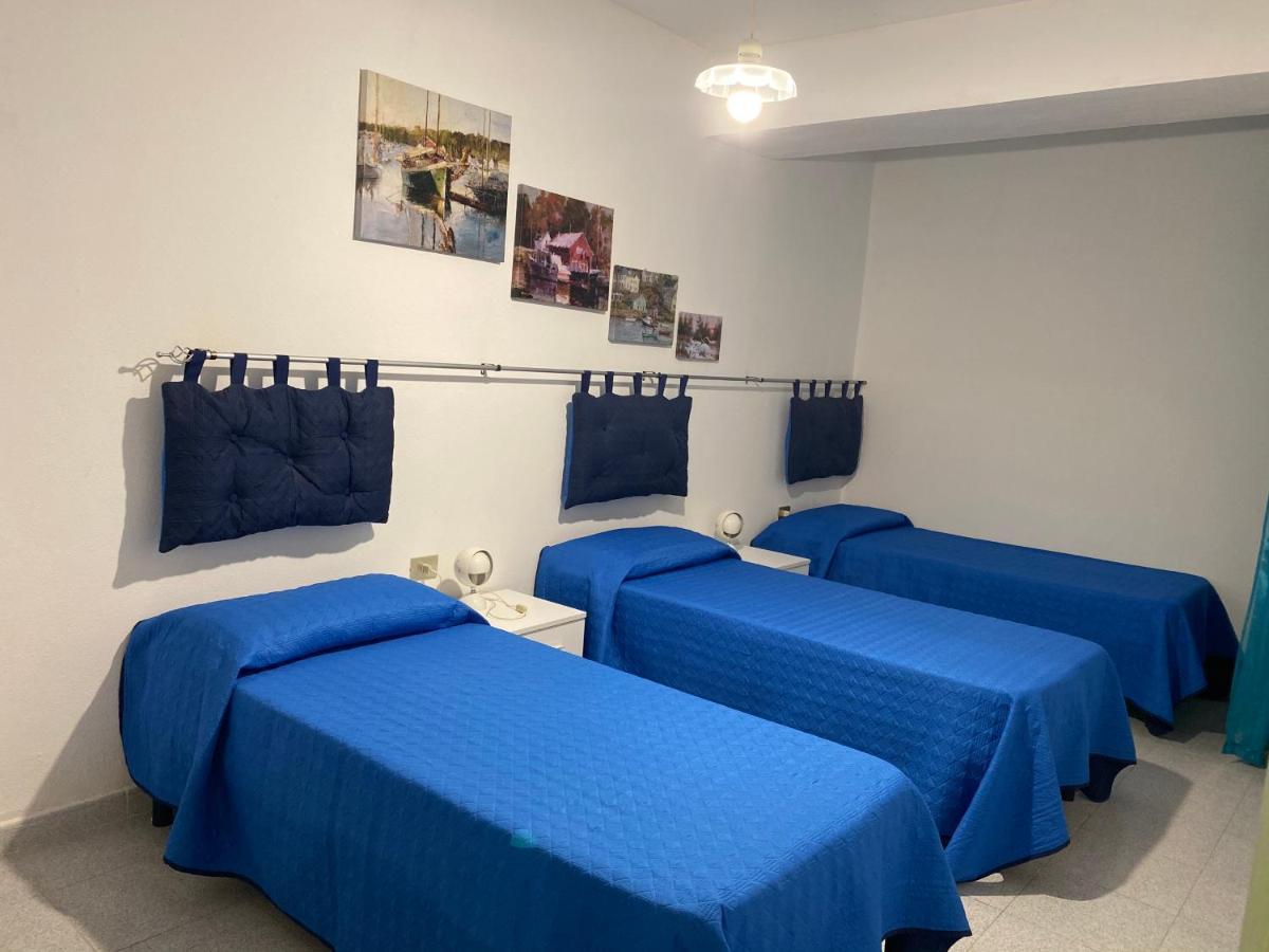 La Casa Gialla Cala Gonone Bagian luar foto